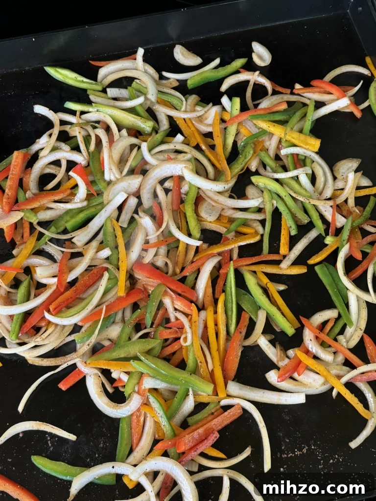 Pepper Steak Quesadillas Recipe: Quick Savory Filled Tortillas 4 cooking vegetables on the griddle