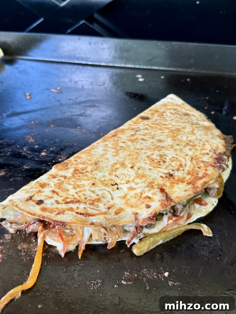Pepper Steak Quesadillas Recipe: Quick Savory Filled Tortillas 8 golden brown quesadilla