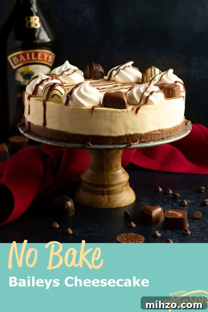 No-Bake Baileys Cheesecake Recipe: Creamy Irish Cream Dessert 17 A whole no bake Baileys cheesecake on a cake stand with a bottle of Baileys behind it
