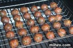 Cheesy Jalapeño-Stuffed Meatballs with Creamy Filling 7 meatballs-on-smoker