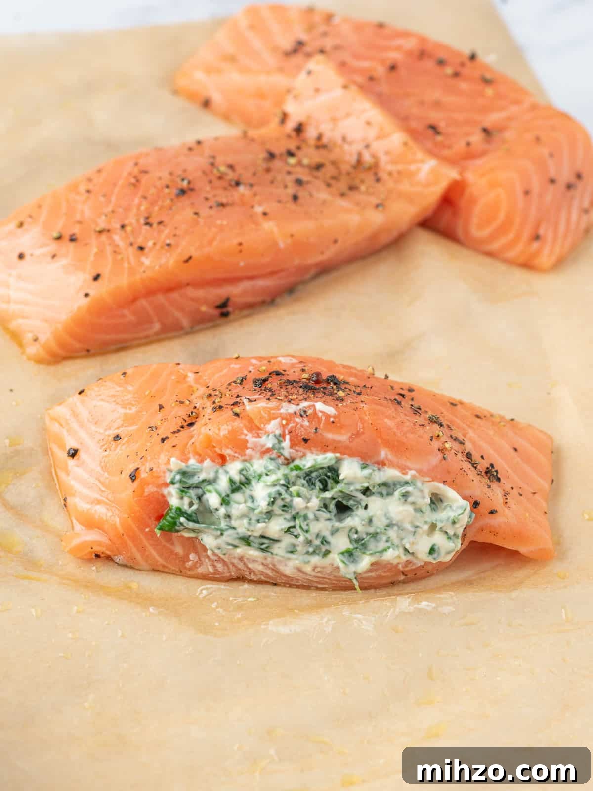 Creamy Spinach-Stuffed Salmon Fillets with Garlic Butter 7 Salmon stuffed with creamy spinach.