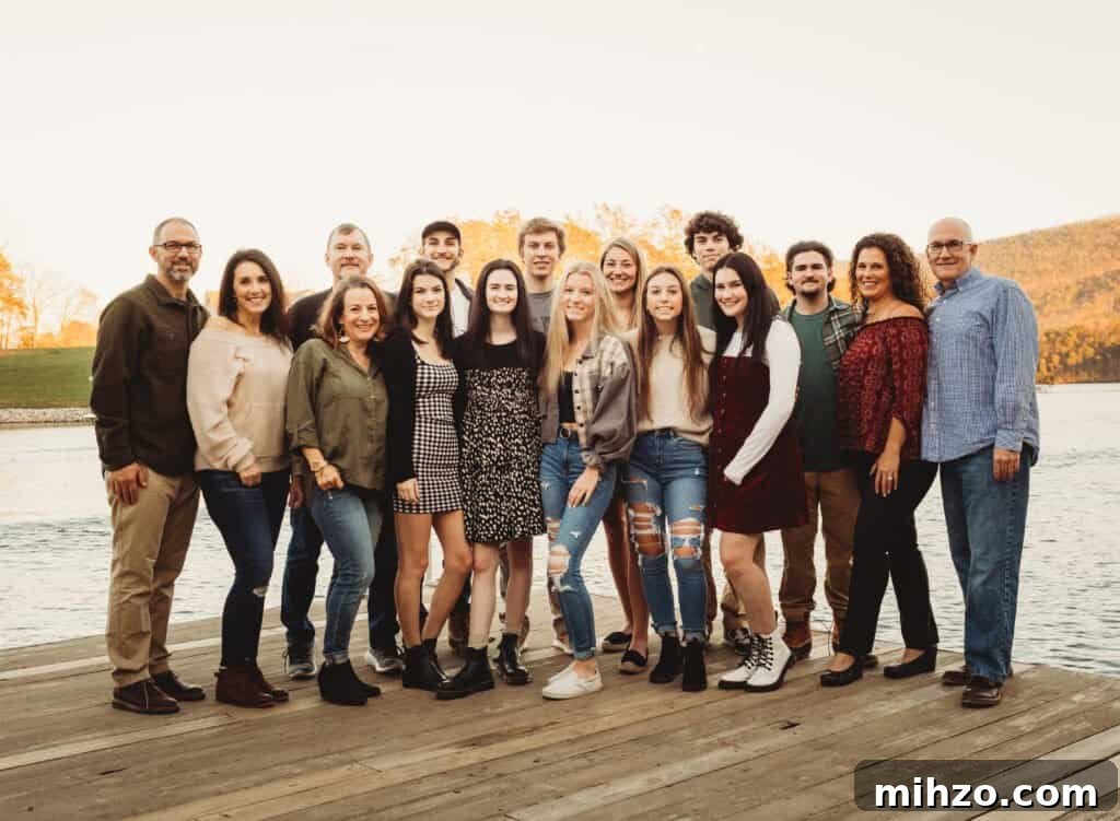 13+ Creative Ways to Make Your Thanksgiving Memorable 14 group of people standing on dock on lake with water behind them