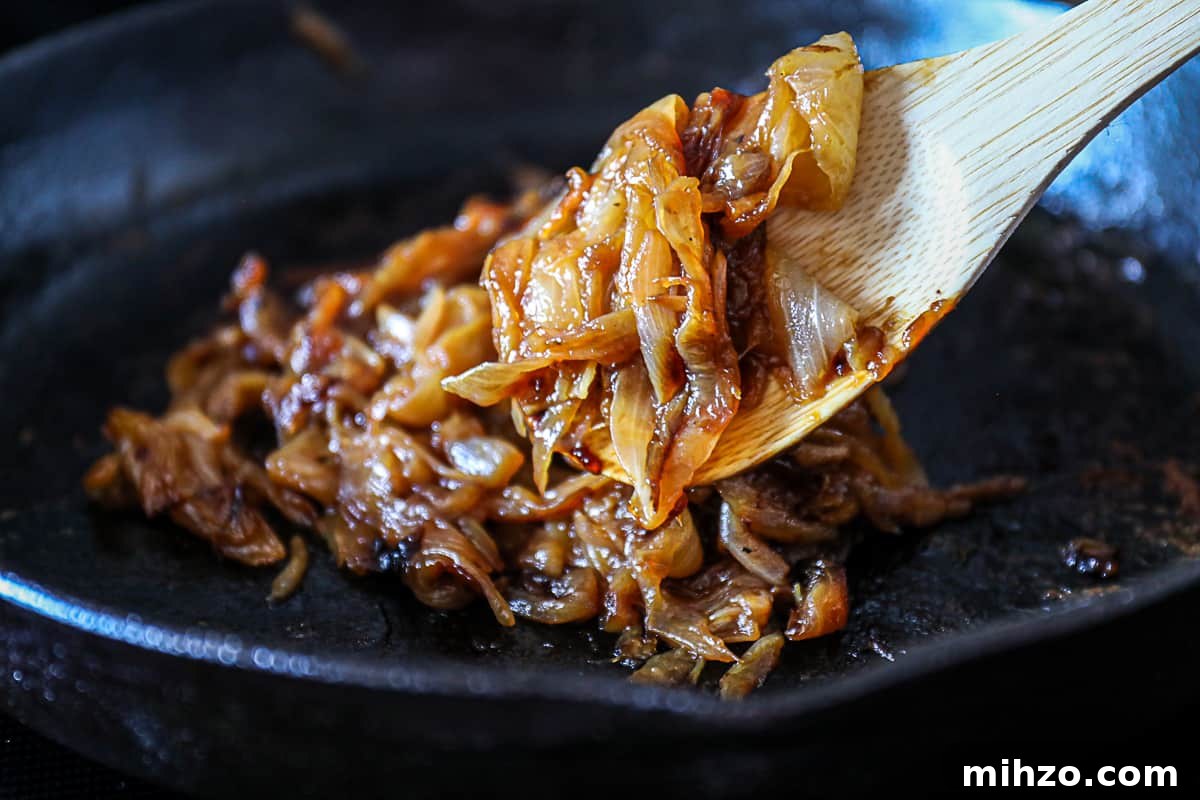 Caramelized Onions Recipe for Steaks, Burgers & Side Dishes 6 Caramelized Onions in a cast iron skillet.