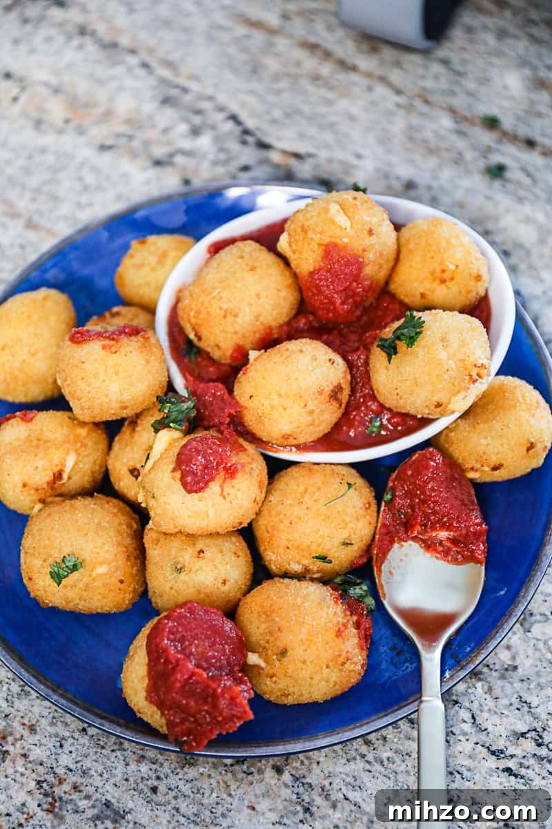 Air Fryer Mac and Cheese Balls from Premade or Frozen 4 Air Fryer Mac And Cheese Balls with dipping sauce