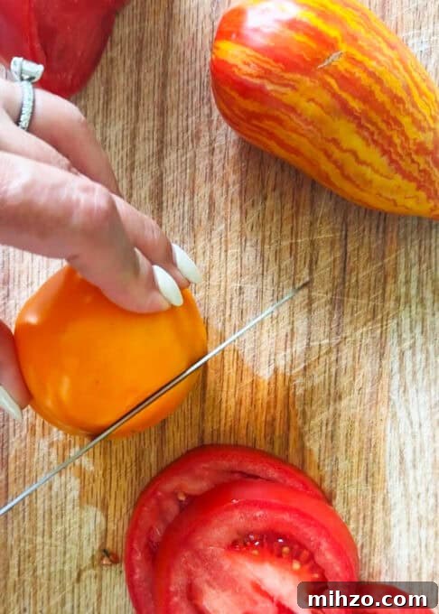 Heirloom tomatoes being sliced