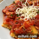 slow cooker ravioli on a white plate