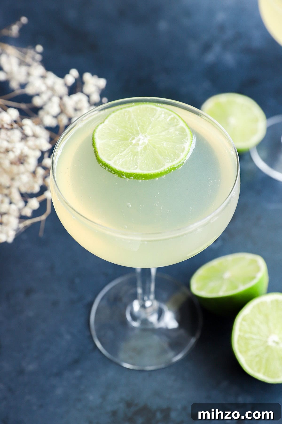 Elderflower Sparkling Cocktail Guide 9 easy champagne drink in coupe glass with limes