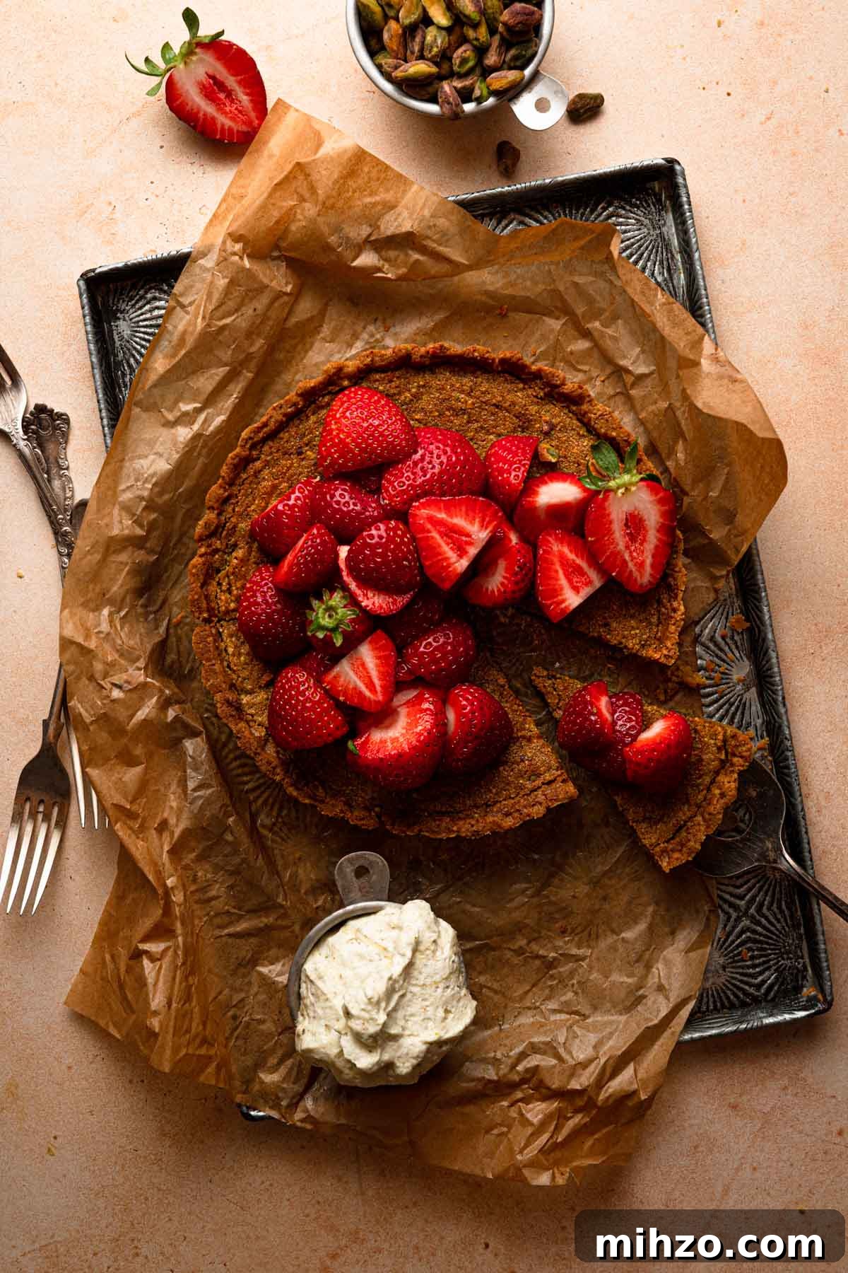 Pistachio Frangipane Tart Recipe — Crunchy Almond-Pistachio Filling 2 Pistachio tart topped with fresh strawberries.