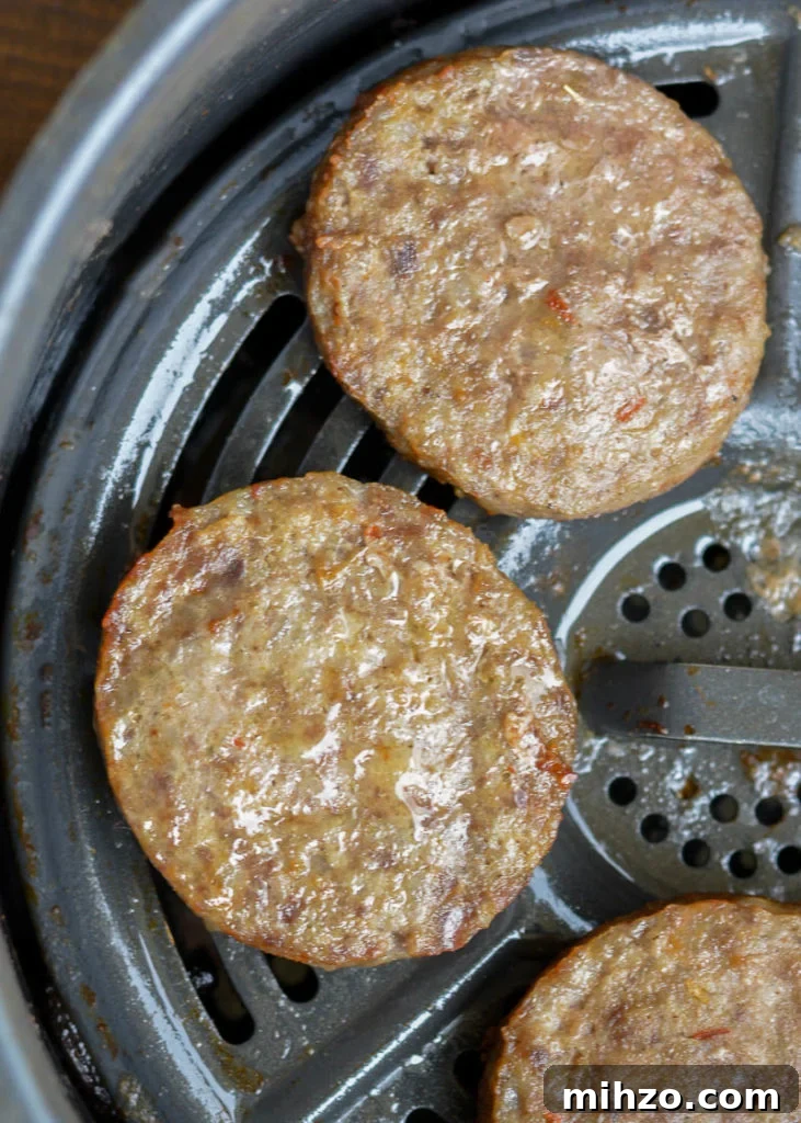 Air Fryer Sausage makes breakfast a breeze! Learn how to cook fresh or frozen sausage patties and links in the air fryer in less than 10 minutes!