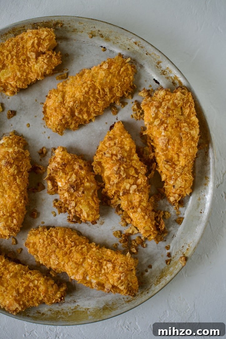 Crunchy Dorito-Crusted Baked Chicken Recipe 7 Dorito Chicken tenders just after coming out of the oven.