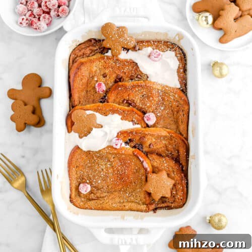 Overnight Gingerbread Chocolate Chip French Toast Bake 20 flat lay of gingerbread french toast casserole on white napkin with gingerbread cookies