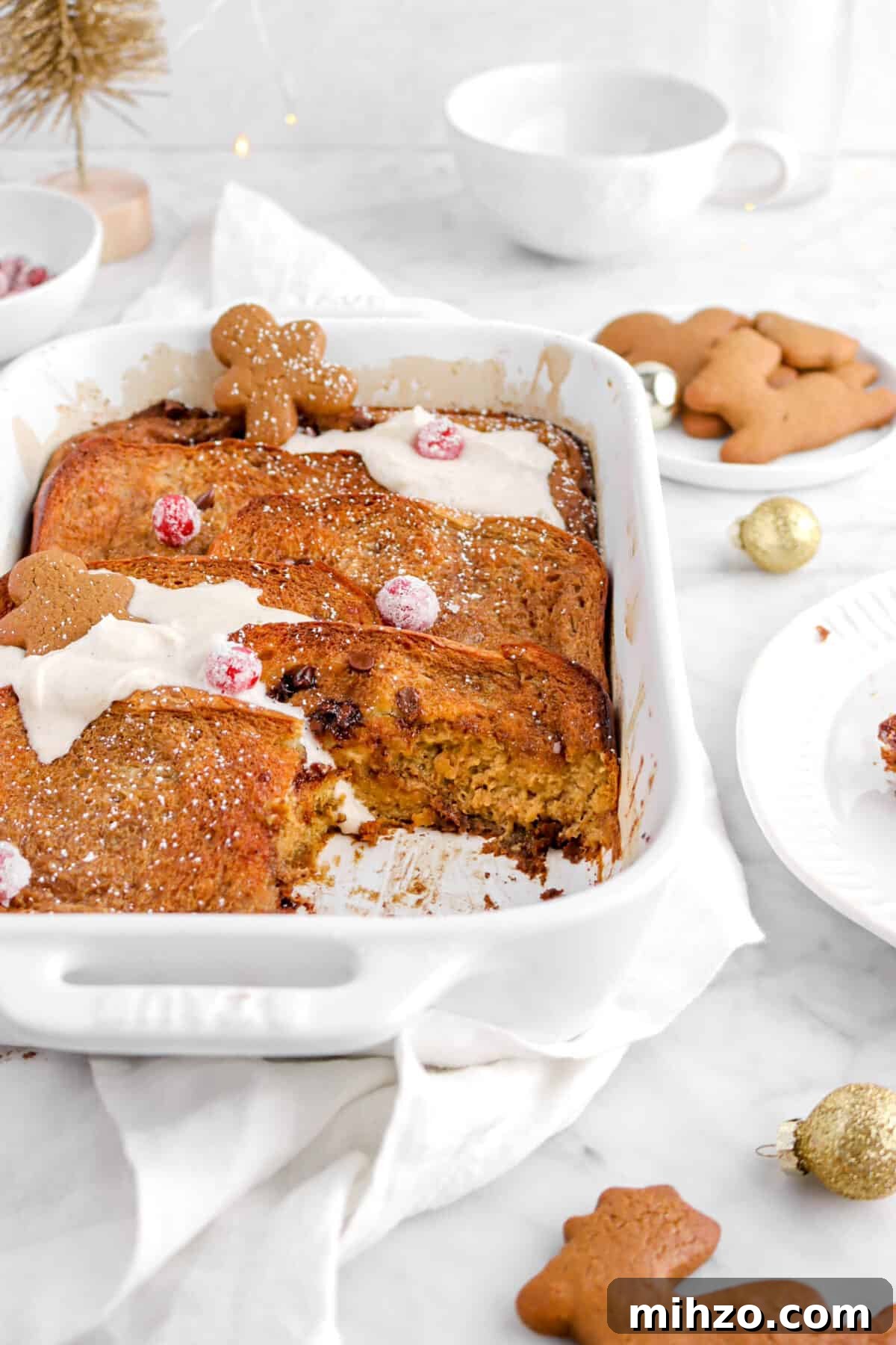 Overnight Gingerbread Chocolate Chip French Toast Bake 4 close up of slice missing from casserole
