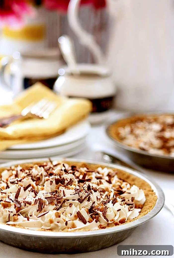 Bourbon-Infused Banoffee Pie: Caramel and Banana Dessert 2 Whole Banana and Caramel Pie with Whipped Cream and Toffee Bits