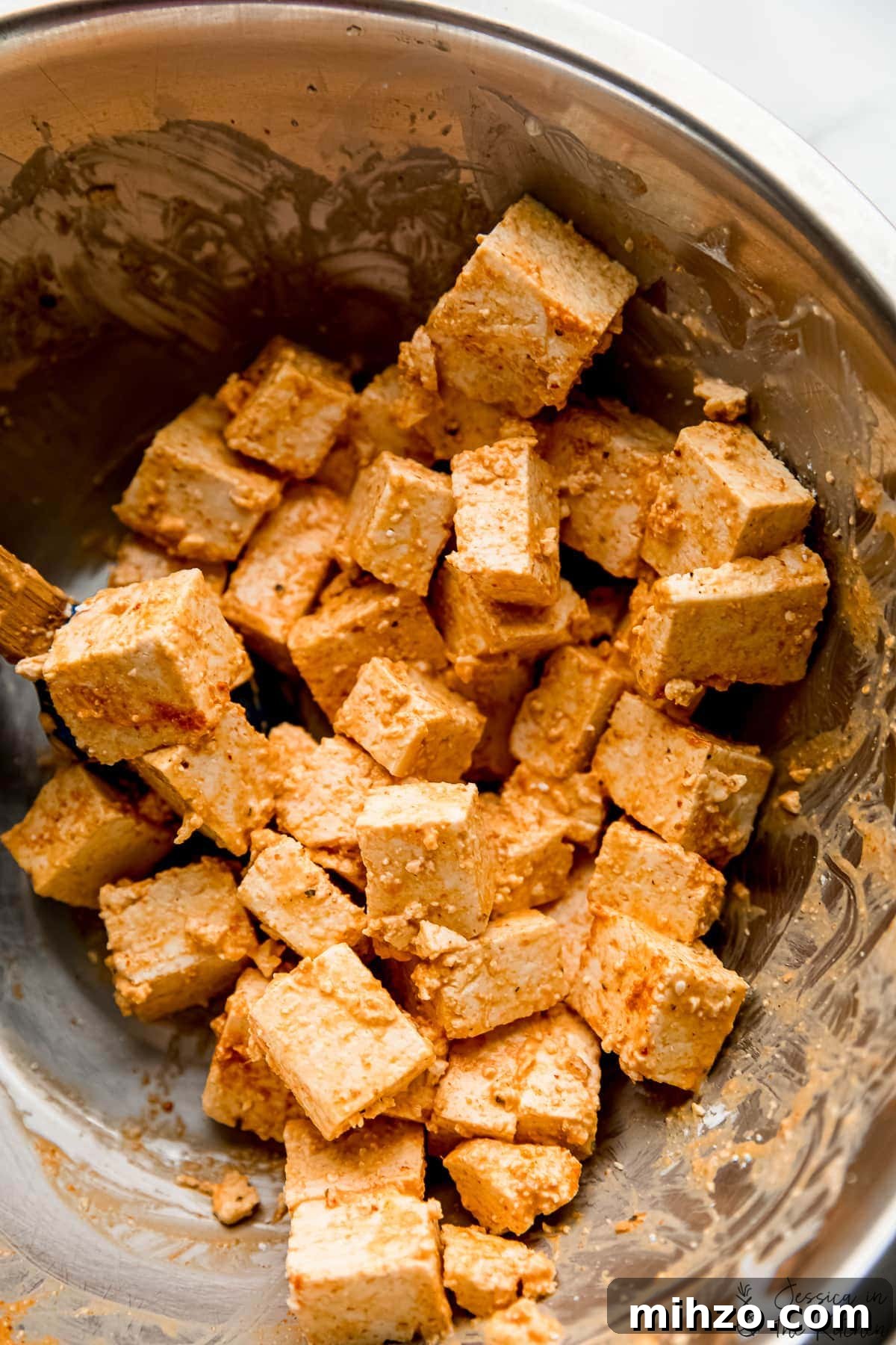 Authentic Thai Red Curry Recipe: Creamy Coconut Chicken Curry 2 Tofu cubes in metal bowl with marinade
