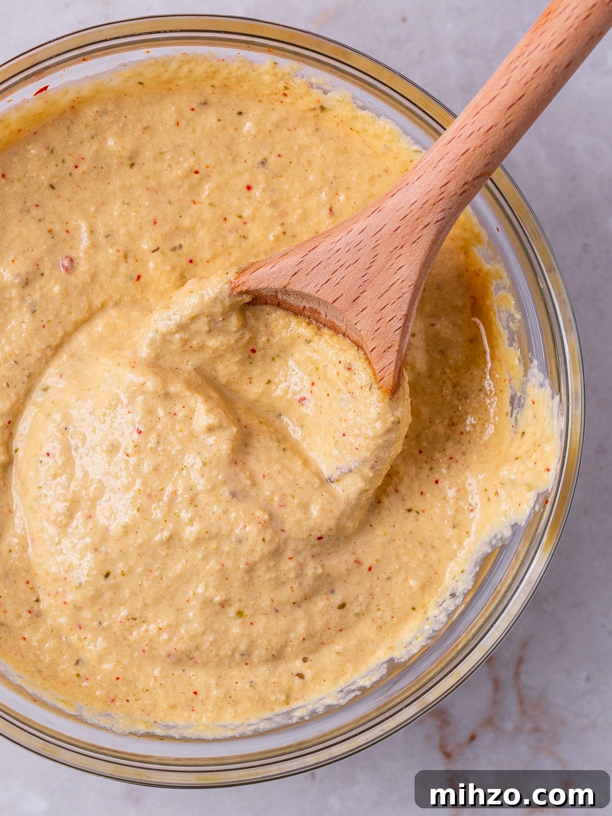 Teriyaki Beef Bowl with Spicy Kimchi Mayo Dressing 8 small bowl of kimchi mayo with spoon in it