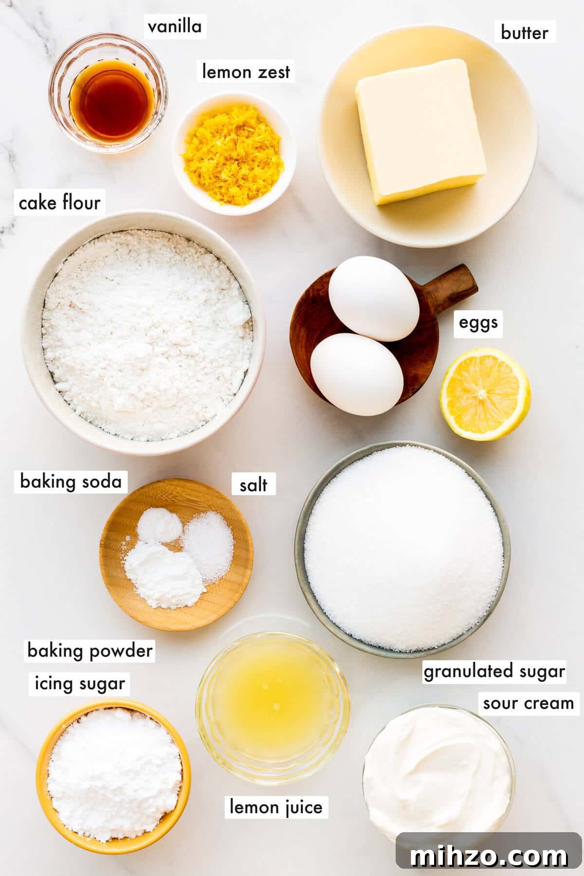 Moist Lemon Loaf Cake Recipe with Zesty Glaze 3 Ingredients to make lemon loaf cake from scratch measured out and ready to mix.