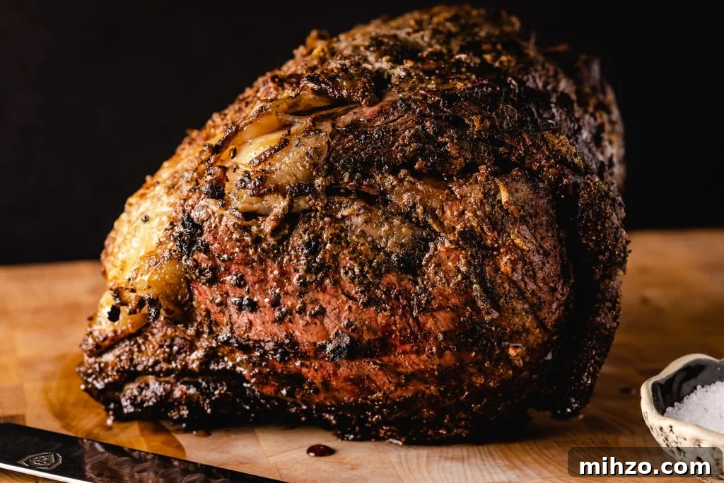 Smoked Prime Rib Roast Recipe for Tender, Juicy Results 6 Smoked prime rib on a cutting board.
