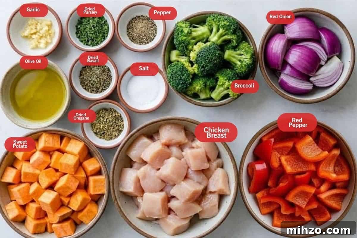 Roasted Chicken with Maple-Glazed Sweet Potatoes 3 Flat lay photo of ingredient shot of garlic, dried parsley, pepper, dried basil, broccoli, red onion, red pepper, chicken breast, dried oregano, salt, sweet potatoes, olive oil, pepper