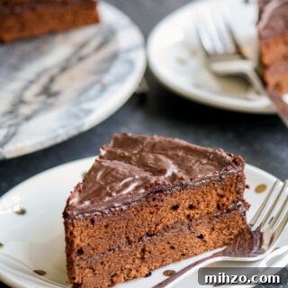 Soft chocolate sponge filled and covered with apricot jam plus a crackly chocolate glaze