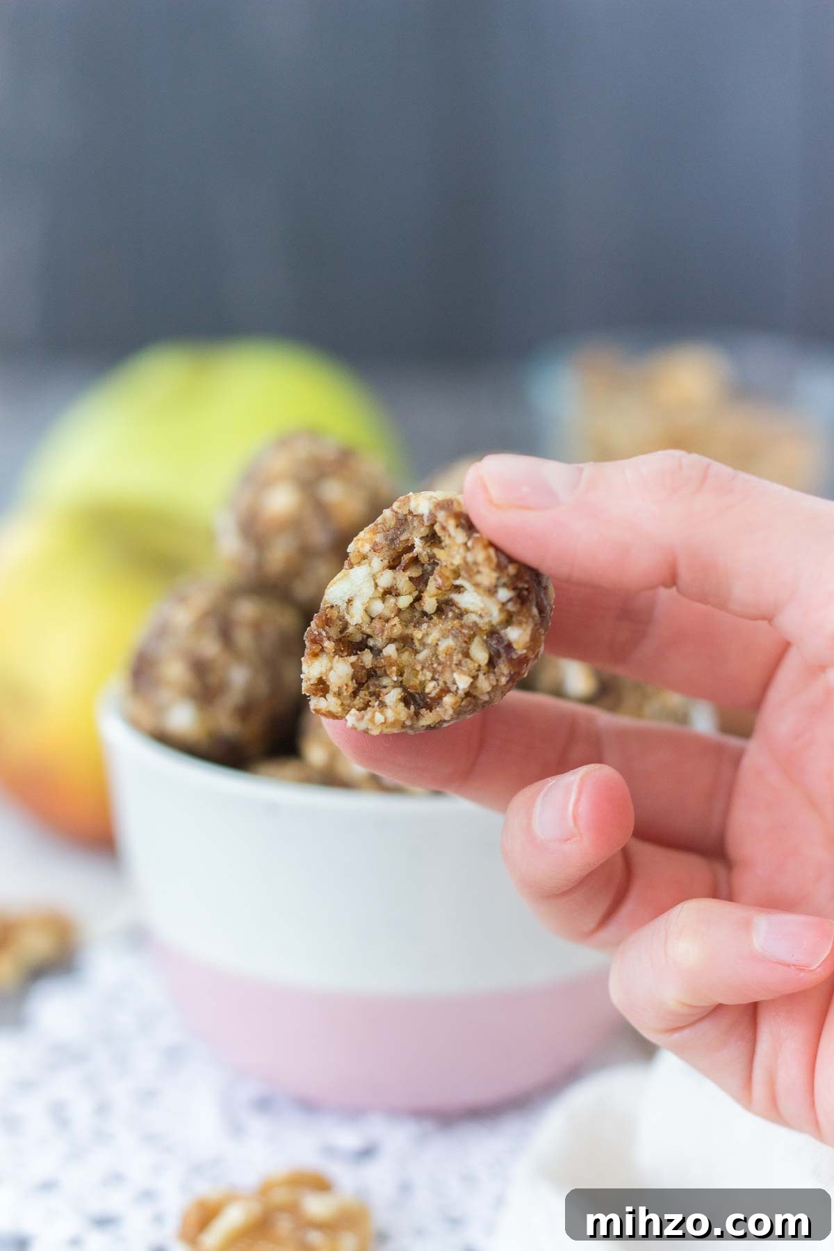 hand holding Apple Pie Energy Bites