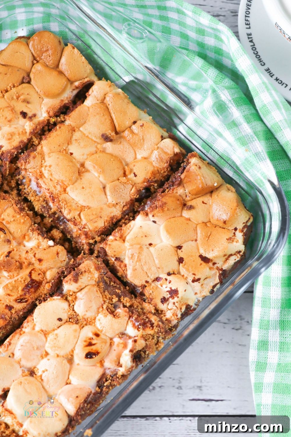 S'mores Bars Recipe: Gooey Chocolate and Graham Cracker Squares 2 Close up image of smores bars in a baking pan