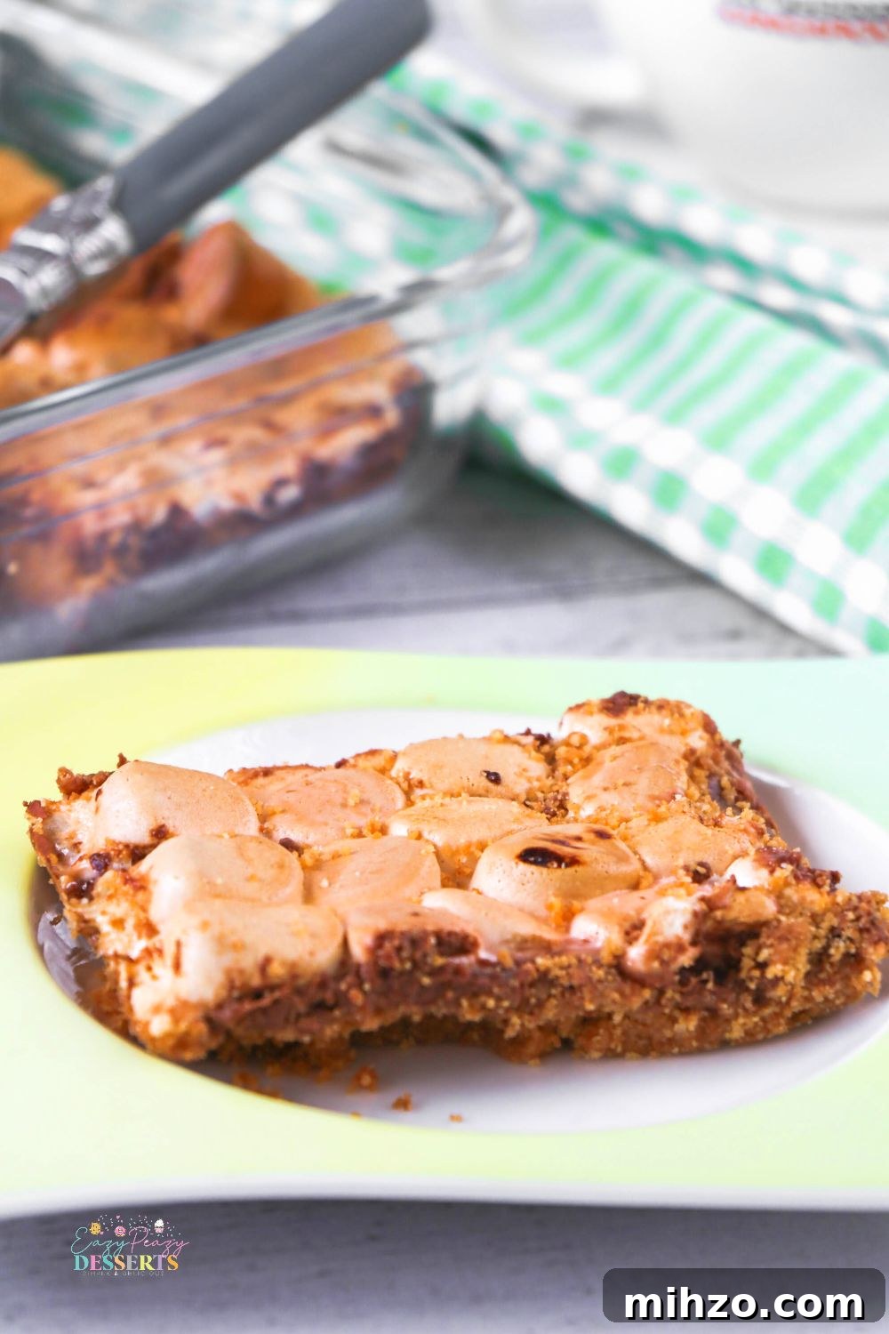 S'mores Bars Recipe: Gooey Chocolate and Graham Cracker Squares 5 Close up image of a smore bar