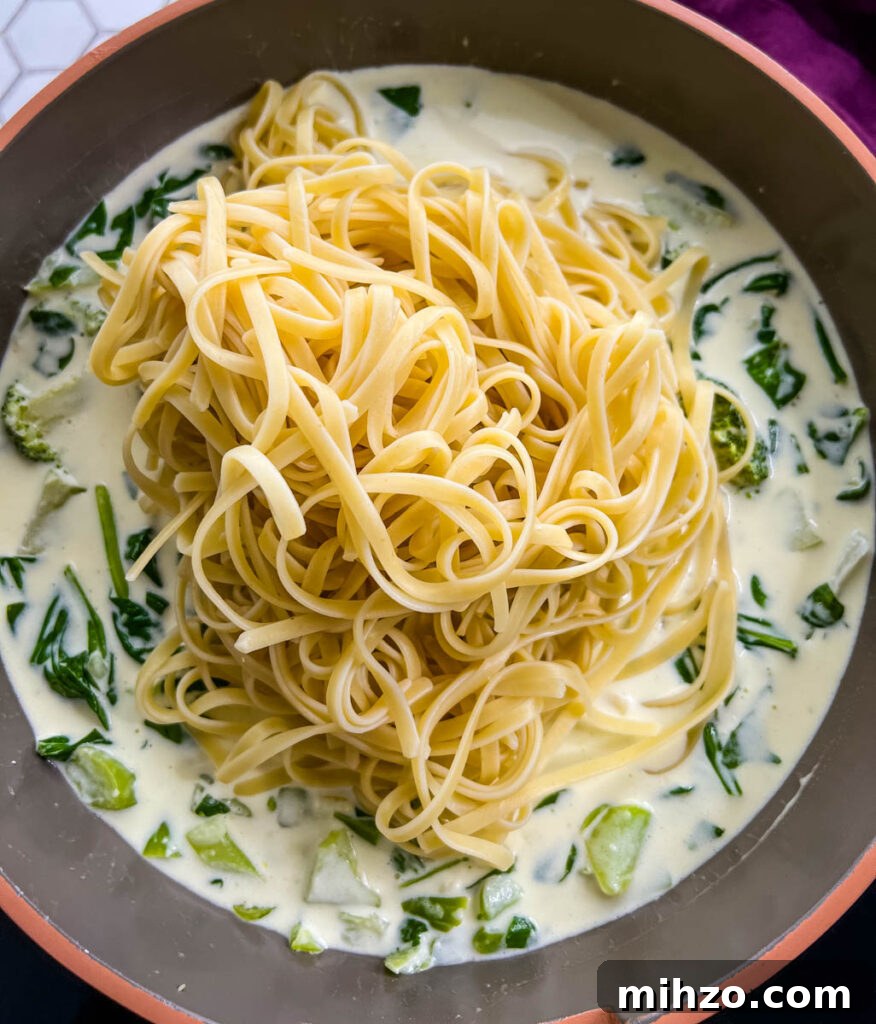 Lemon Garlic Chicken Pasta with Creamy Parmesan Sauce 12 lemon chicken pasta in a pan