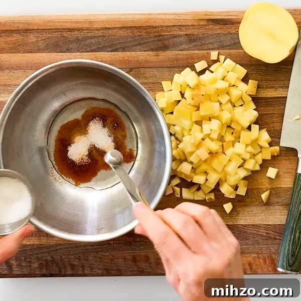 High-Protein Breakfast Burrito with Crispy Potato Filling 5 Mixing the seasonings in the light olive oil for the crispy potatoes.