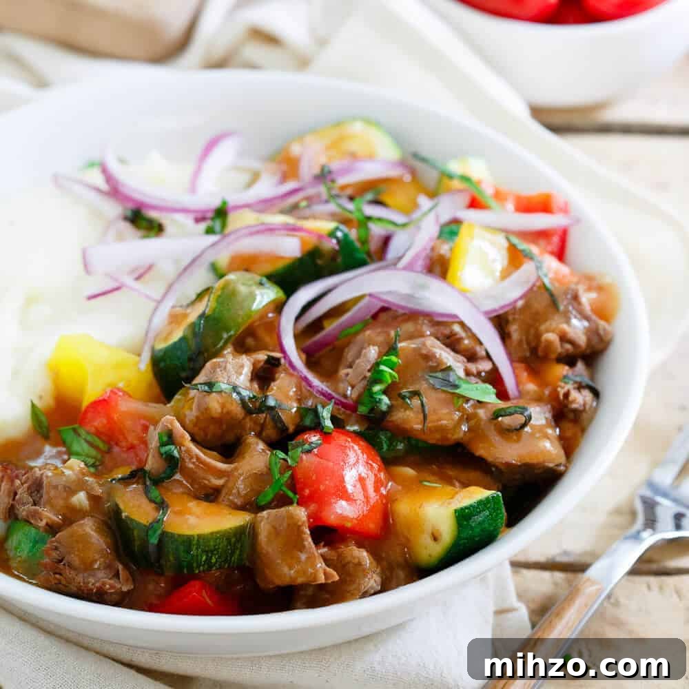 This summer beef stew is made in the slow cooker so the house stays cool. Enjoy this classic dish with a summer vegetable twist!