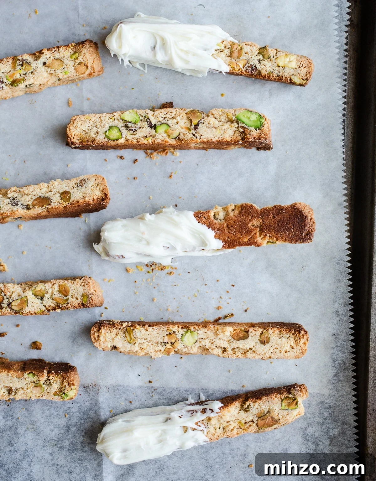 Gluten-Free Pistachio Biscotti Recipe for Crispy, Nutty Treats 10 Pistachio biscotti on a baking sheet.