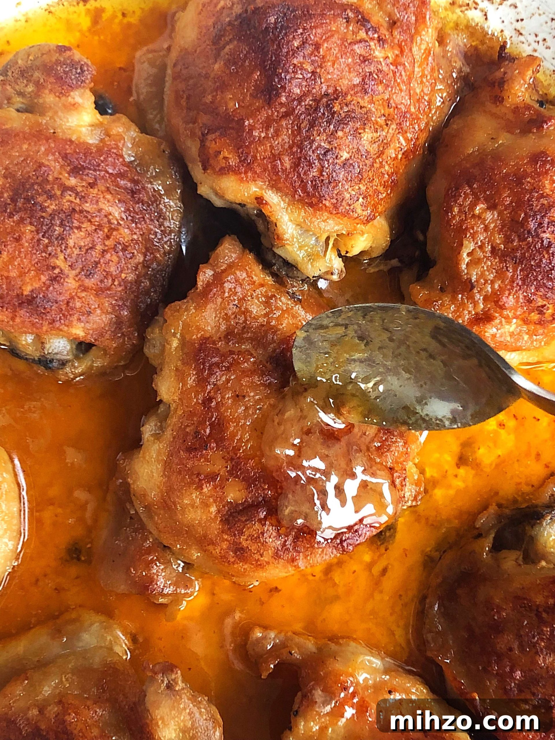Crispy Buttered Buffalo Baked Chicken Thighs 2 Basting the baked chicken thighs