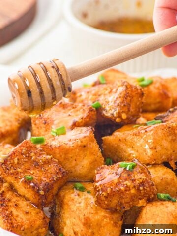 Drizzling honey on salmon bites