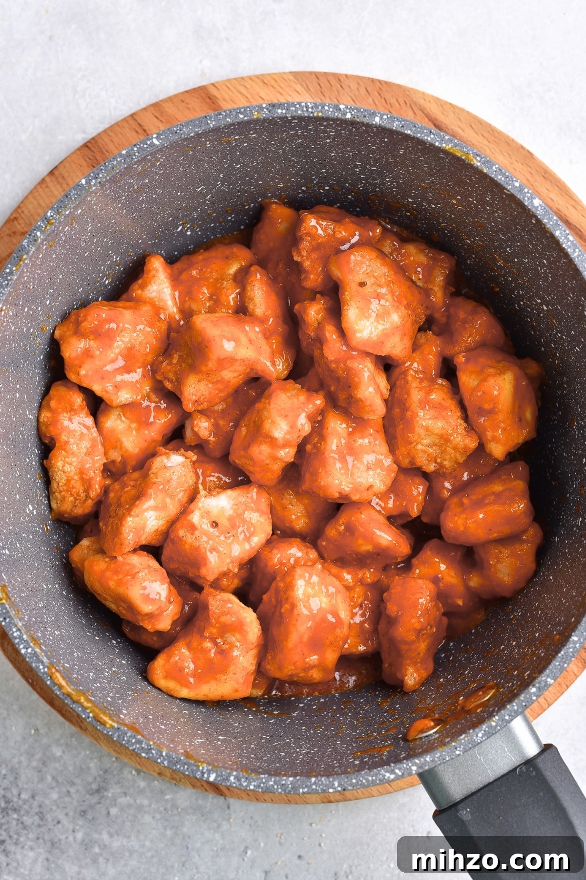 Gluten-Free Buffalo Chicken Buffalo chicken in saucepan