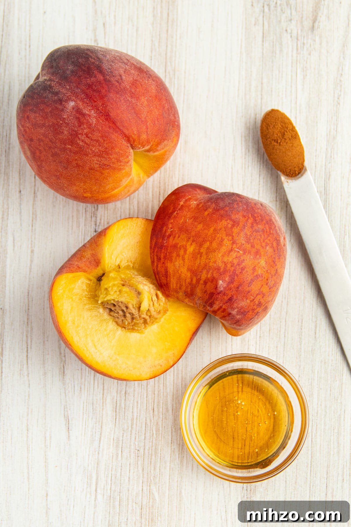 Crispy Air Fryer Peaches with Honey-Brown Sugar Glaze 4 Picture of ingredients including peaches, honey and cinnamon.