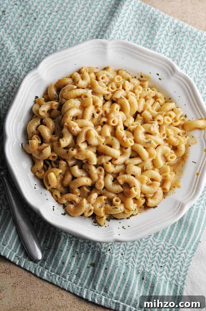 Zesty Pepper Jack Macaroni and Cheese Recipe: Creamy, Spicy Twist 3 Spicy Macaroni & Cheese in white bowl