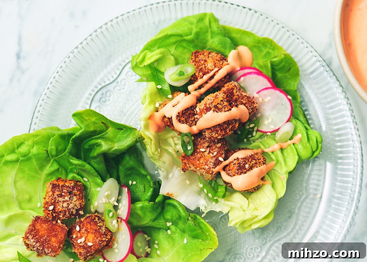 Quick Sriracha Aioli Recipe with 3 Ingredients 12 Lettuce wraps with crispy breaded air fryer tofu and sriracha aioli.