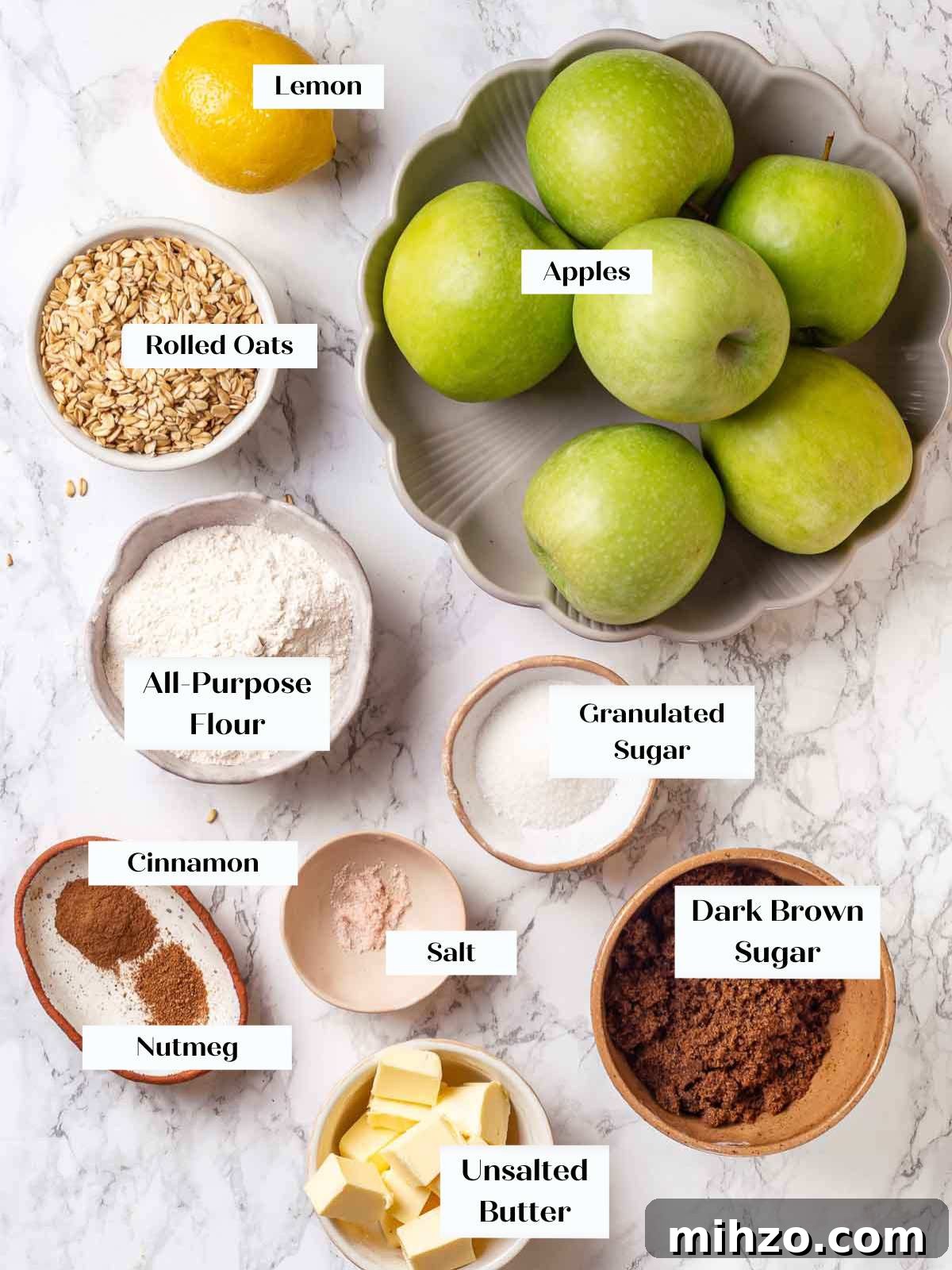 apple crisp ingredients on marble.