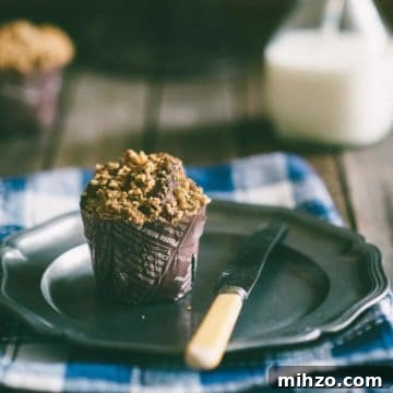 Crunchy Walnut Muffins Recipe for Moist, Nutty Morning Treat 6 a muffin on a plate