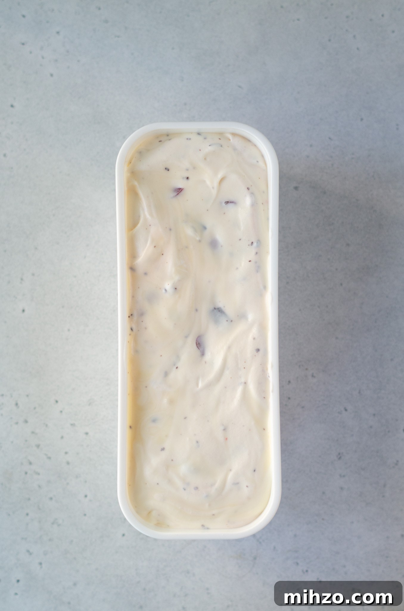 cherry cordial ice cream in a ice cream container