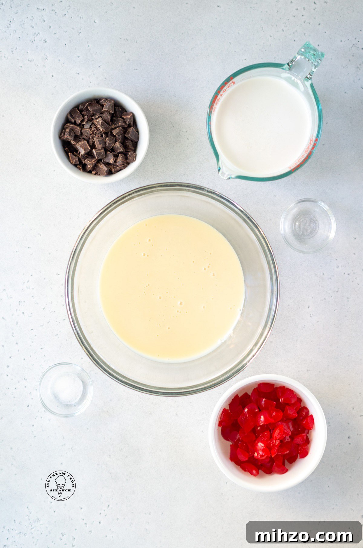 The ingredients needed to make no churn cherry ice cream with chocolate and sweetened condensed milk.