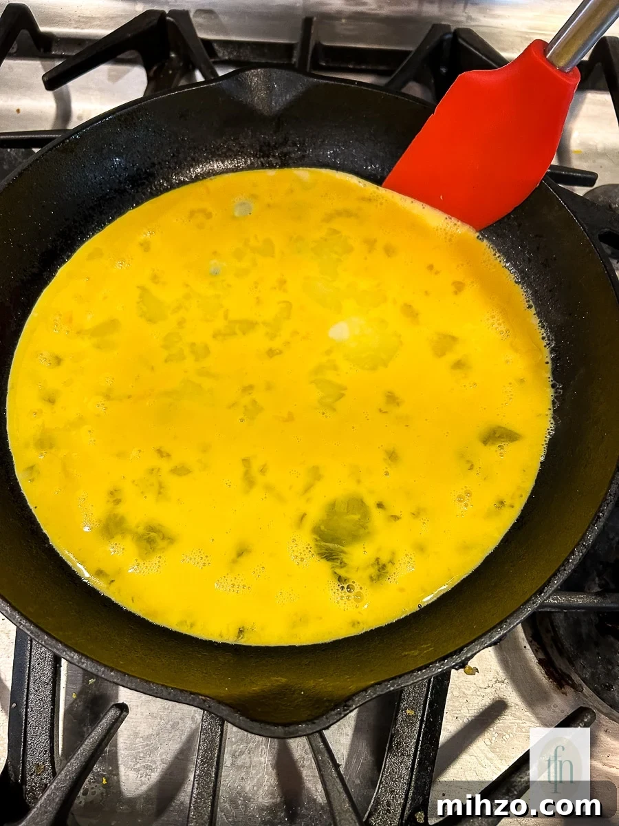 Sourdough Breakfast Sandwich Ideas for Quick Morning Meals 6 Image shows how to make fluffy eggs in a skillet.