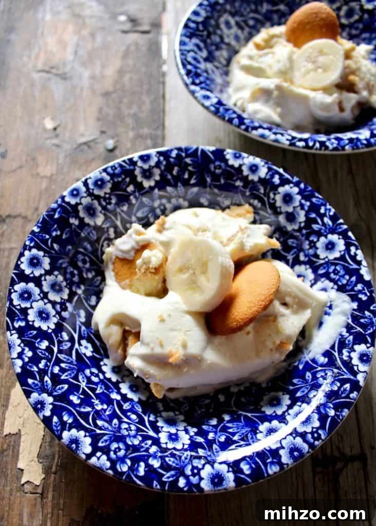 Magnolia Bakery-Style Banana Pudding Recipe That Impresses 2 Magnolia Bakery's Famous Banana Pudding, single serving in blue dessert bowl