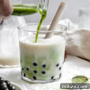 process shot of adding matcha powder to glass