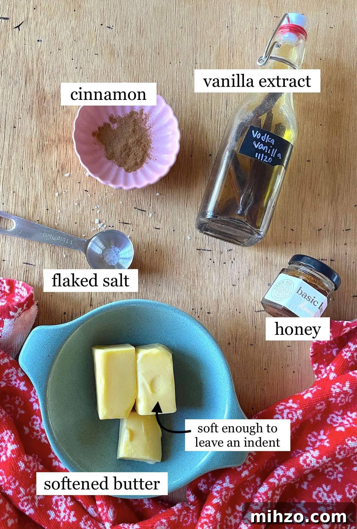 Whipped Honey Butter Recipe: Smooth, Spreadable & Quick 3 The ingredients in honey butter, laid out in small bowls and labeled.