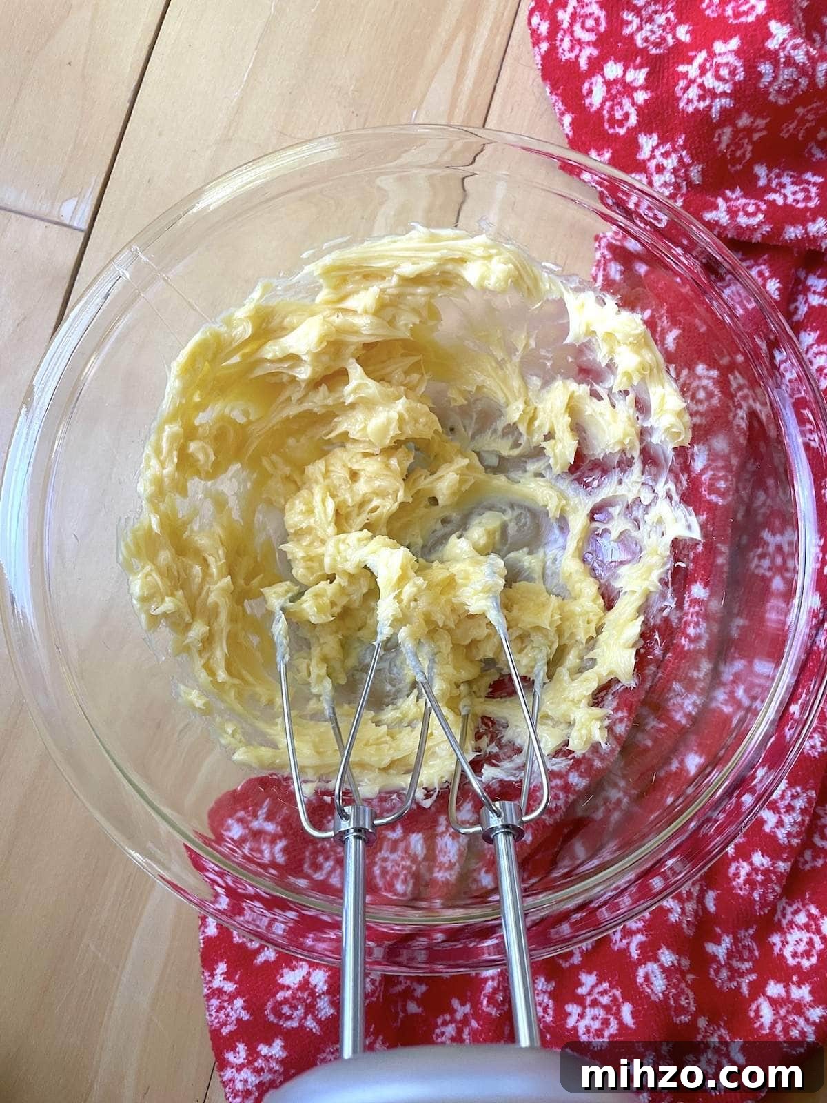 Whipped Honey Butter Recipe: Smooth, Spreadable & Quick 5 Honey butter in a mixing bowl after being whipped with a hand mixer.
