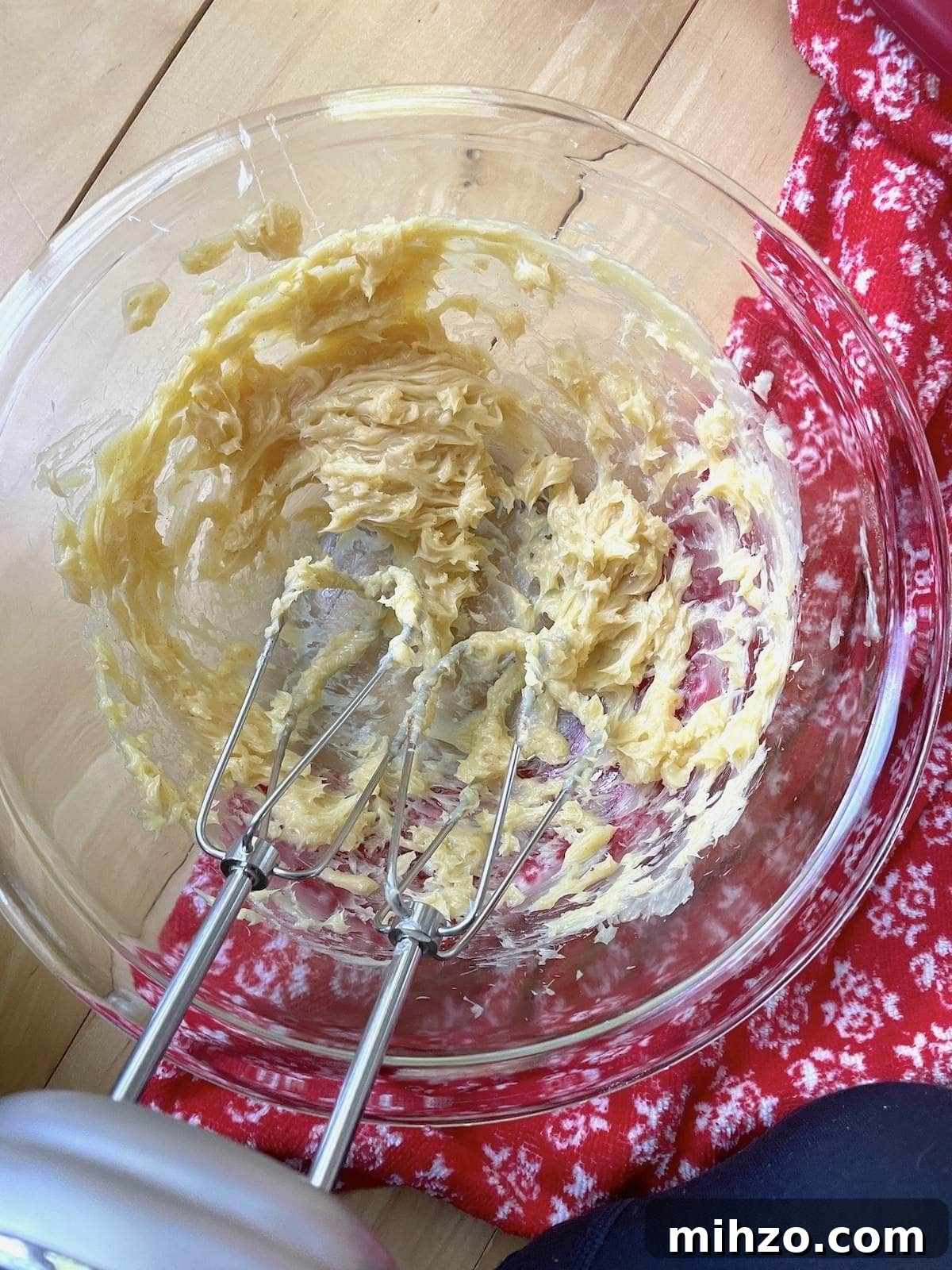Whipped Honey Butter Recipe: Smooth, Spreadable & Quick 8 Vanilla cinnamon honey butter in a mixing bowl after being whipped with a hand mixer.