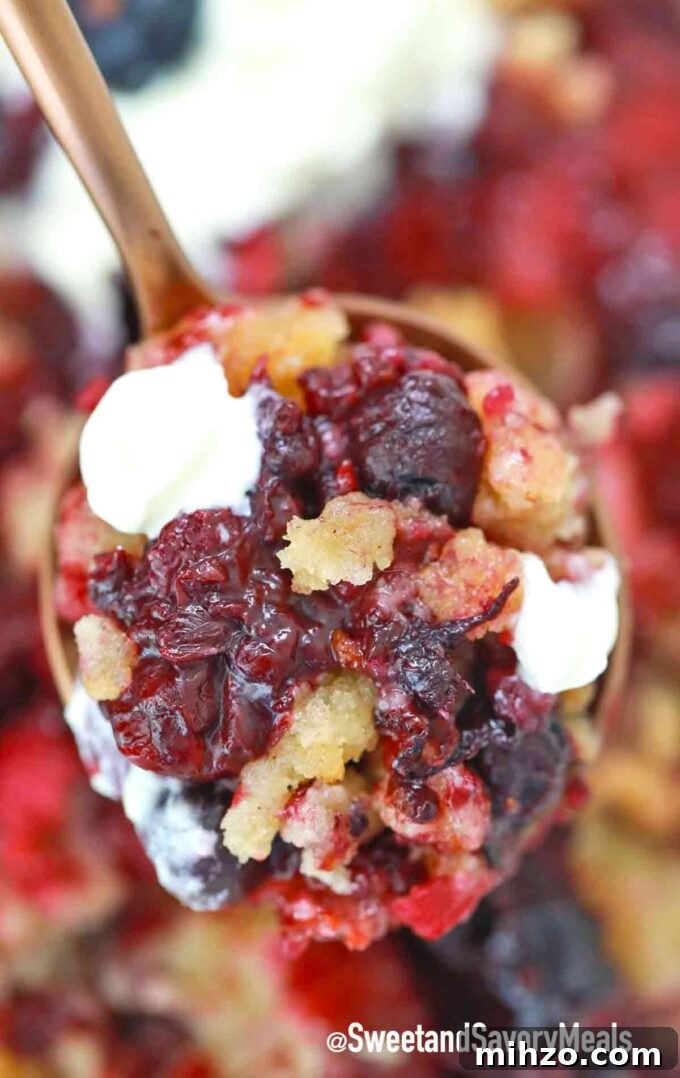 Quick Instant Pot Berry Cobbler Recipe for Juicy Summer Desserts 6 a spoon of instant pot berry cobbler