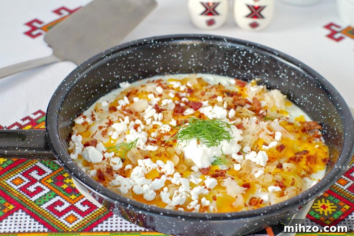 Ukrainian-Style Baked Eggs: Hearty Dinner Recipe 2 Ukrainian style eggs in frying pan