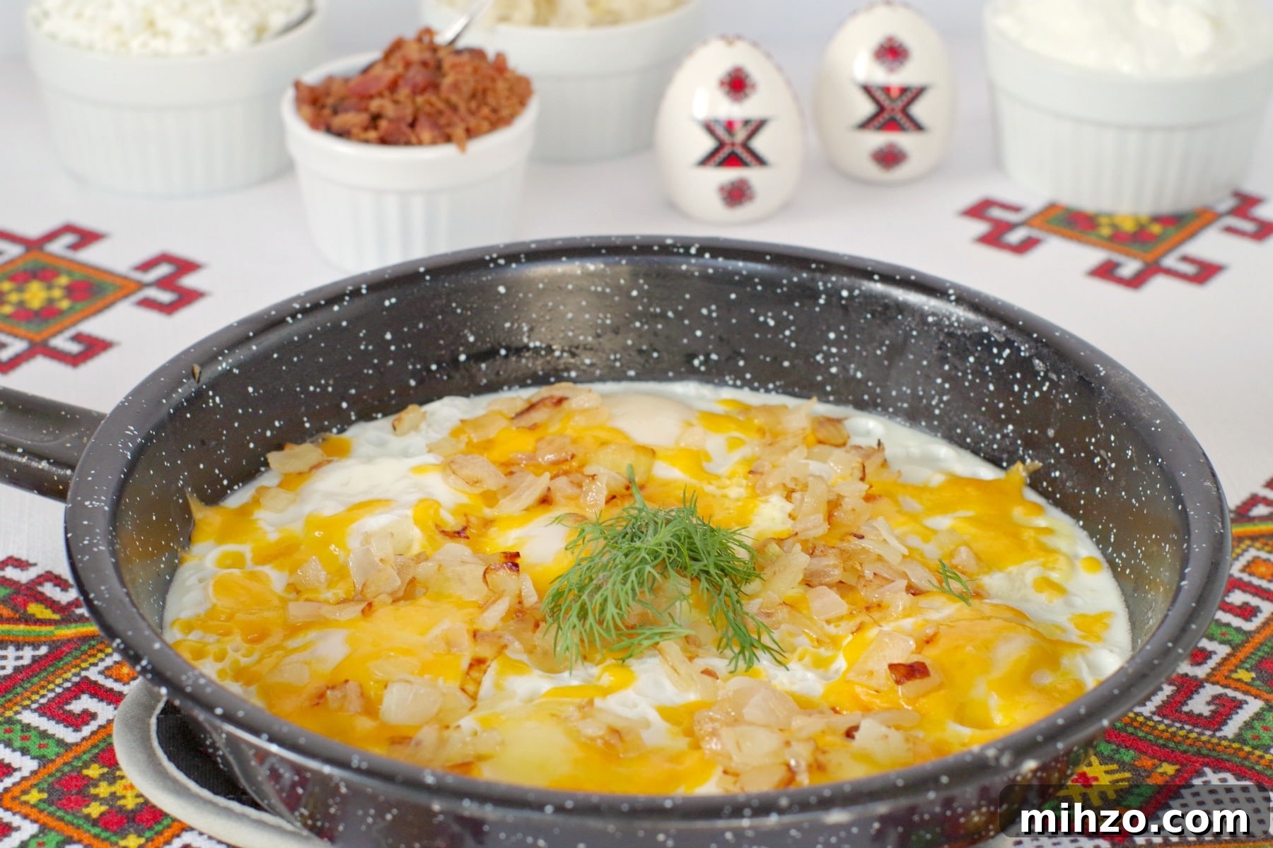 Ukrainian-Style Baked Eggs: Hearty Dinner Recipe 14 Ukrainian style eggs in foreground with toppings in background