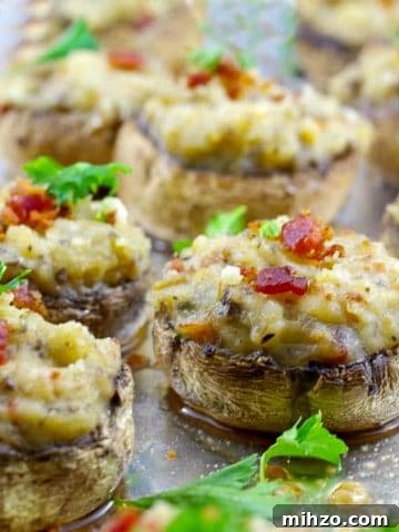 easy pierogi stuffed mushrooms on a baking sheet covered with foil